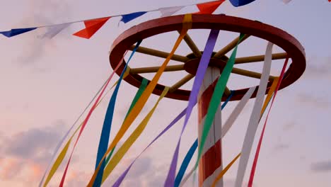 decorative multicolor ribbons on wooden wheel construction