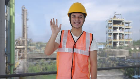 Feliz-Trabajo-De-Construcción-Indio-Saludando