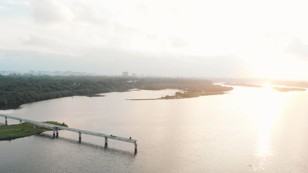 Aerial Over Broken Bridge in Adyar During Golden Yellow Sunset. Follow Shot