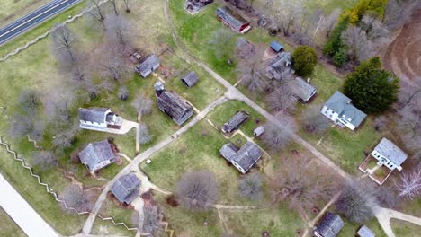 aerial flyover of an 1800s pioneer village