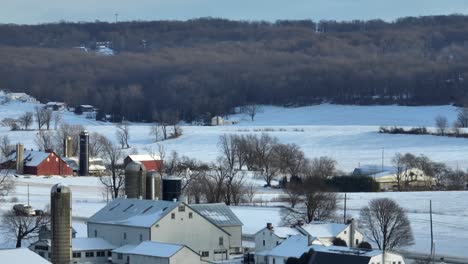 amish farm covered in snow
