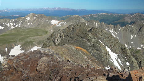 Cinematic-aerial-Rocky-Mountain-Denver-Colorado-Copper-Vail-top-of-the-world-scenic-view-Mount-Quandary-snow-14er-mid-summer-early-morning-Breckenridge-Colligate-peaks-stunning-peaceful-rockies-left