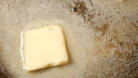 melting butter in a pan