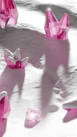 pink crystals on white surface