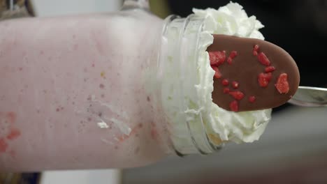 milkshake with whipped cream and chocolate topping