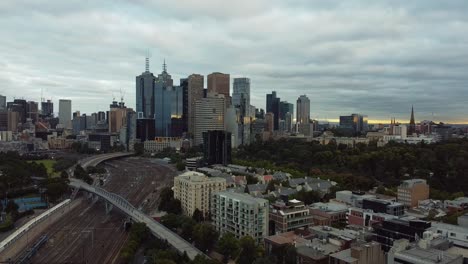 drone shot of melbourne, victoria in coronavirus lockdown - a sweeping scene of the skyline at sunset during the covid-19 outbreak in australia