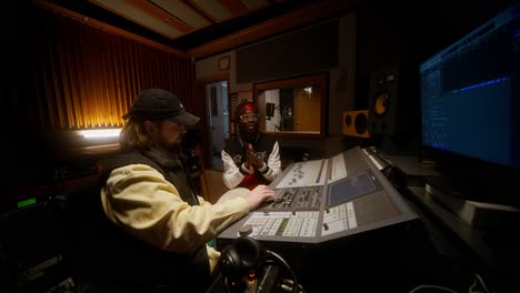 music producers in recording studio