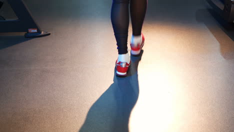 jumping rope. athletic woman training hard at the gym.