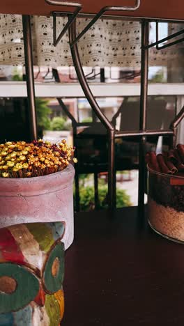 rustic decor shelf with flowers and spices