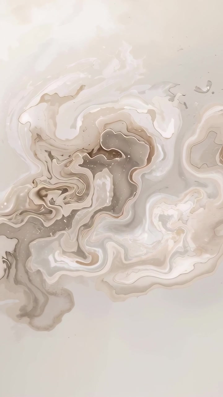 Vertical video: Morphing marbled pattern showing slow swirl after pigment shift on canvas, speckles
