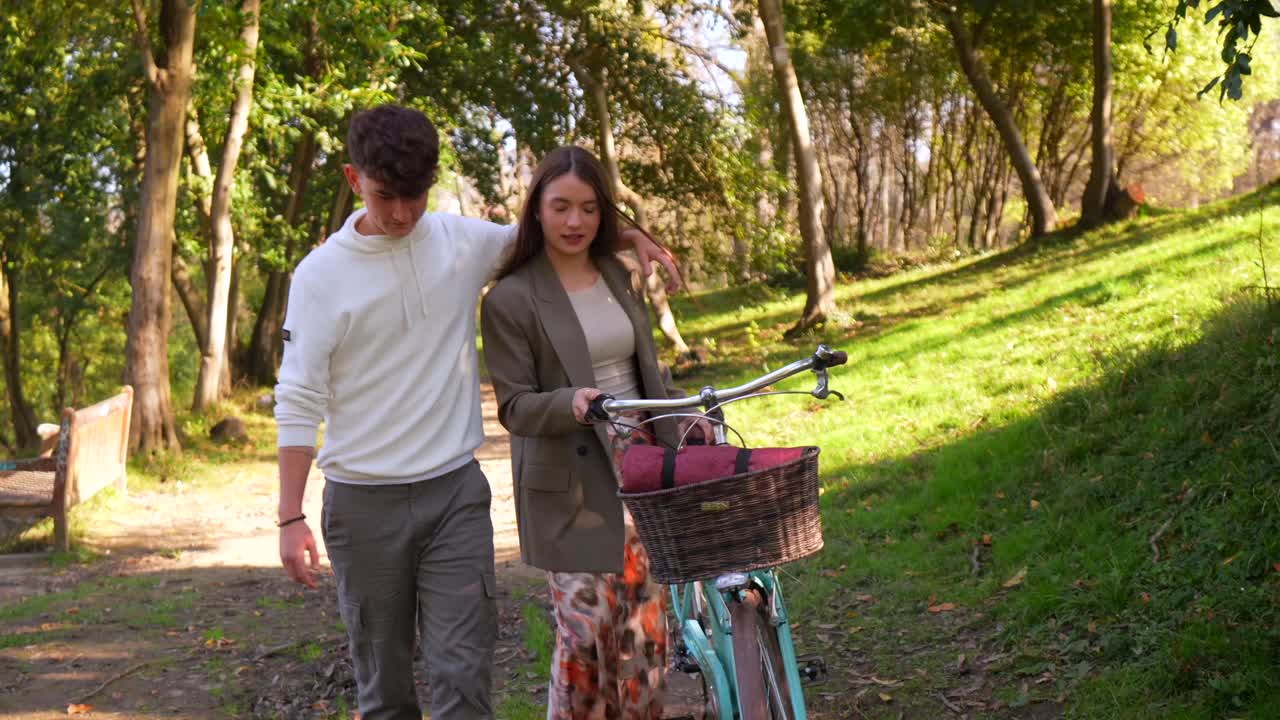 Couple Enjoying a Bike Ride in the Park