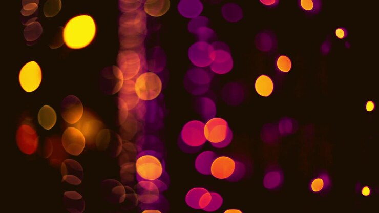 Defocused bokeh cristmas sparkles lights abstract background.