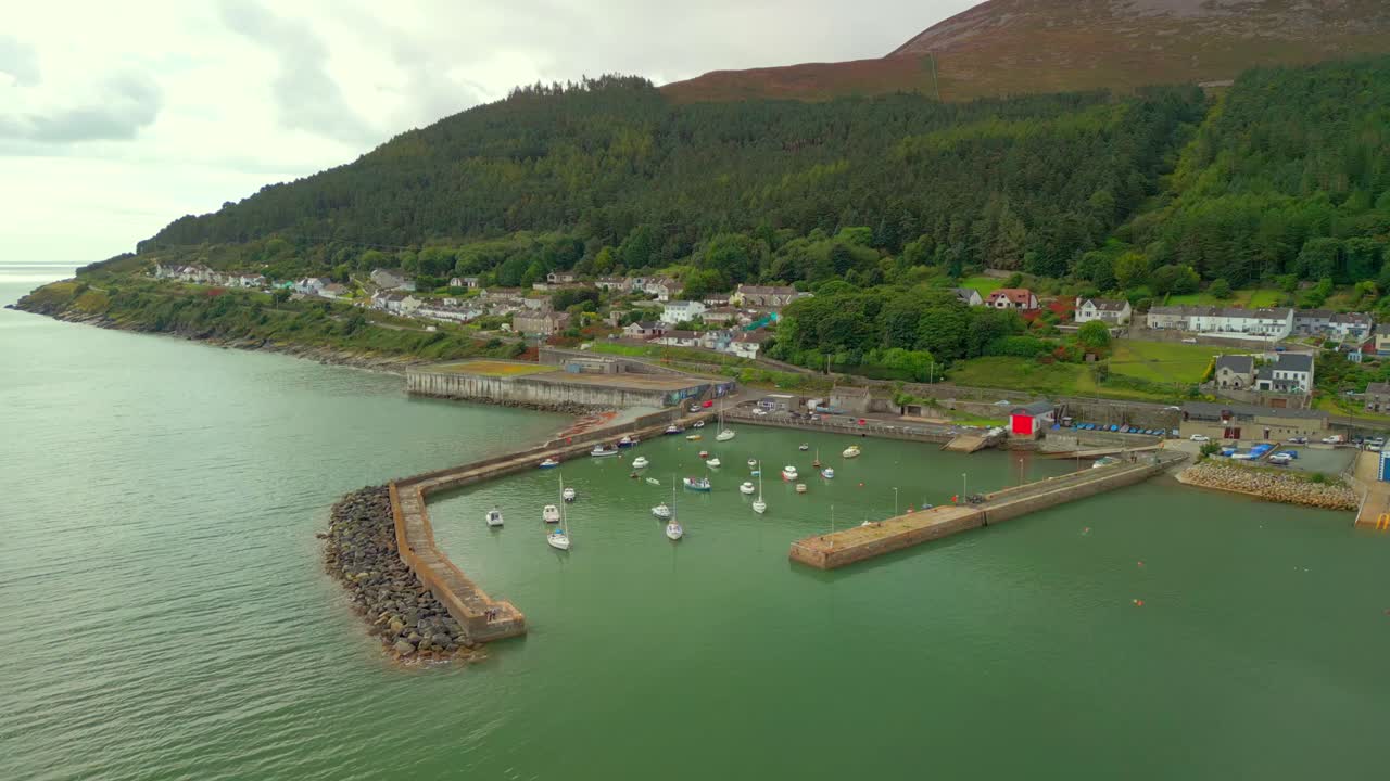 Travelling aerial video of Newcastle Harbour in County Down, Northern Ireland. Filmed in 4K, 60FPS and with Rec709 color