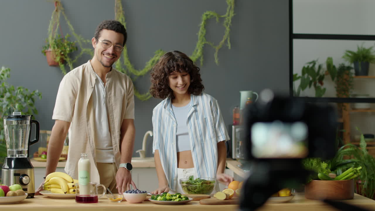 Couple Filming Vegan Food Vlog in Kitchen