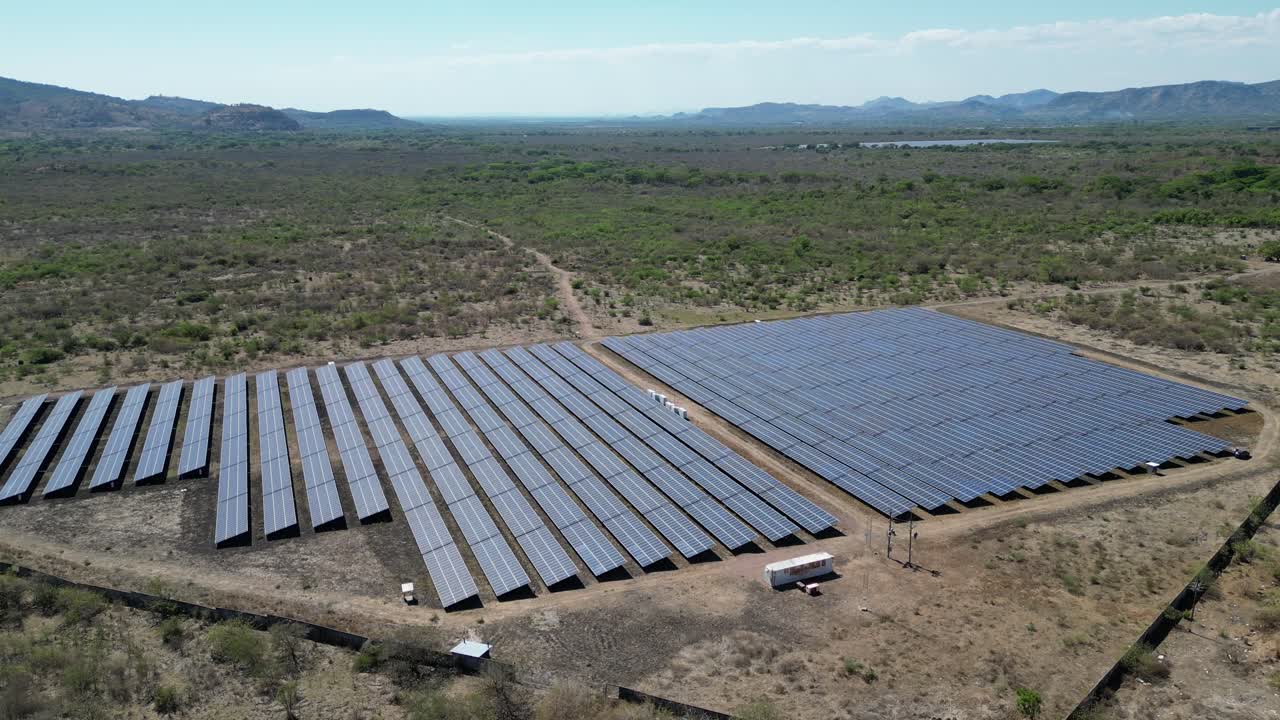 Aerial View of Solar Power Plant in Arid Landscape, Renewable Energy Infrastructure