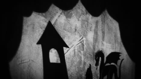 shadow puppets of a dragon and a castle