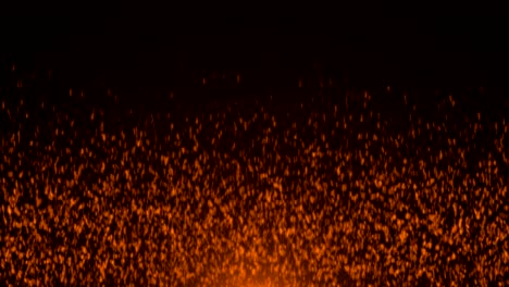 glowing falling particles, on black background