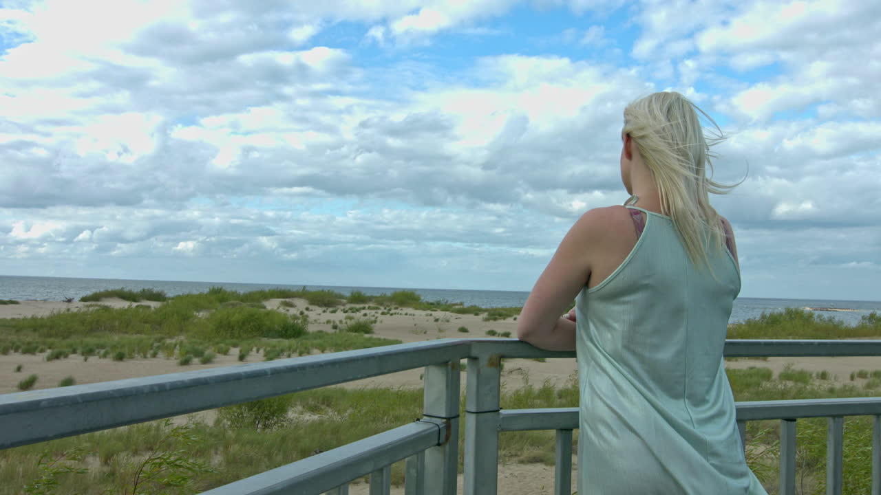 A sad woman looks into the distance