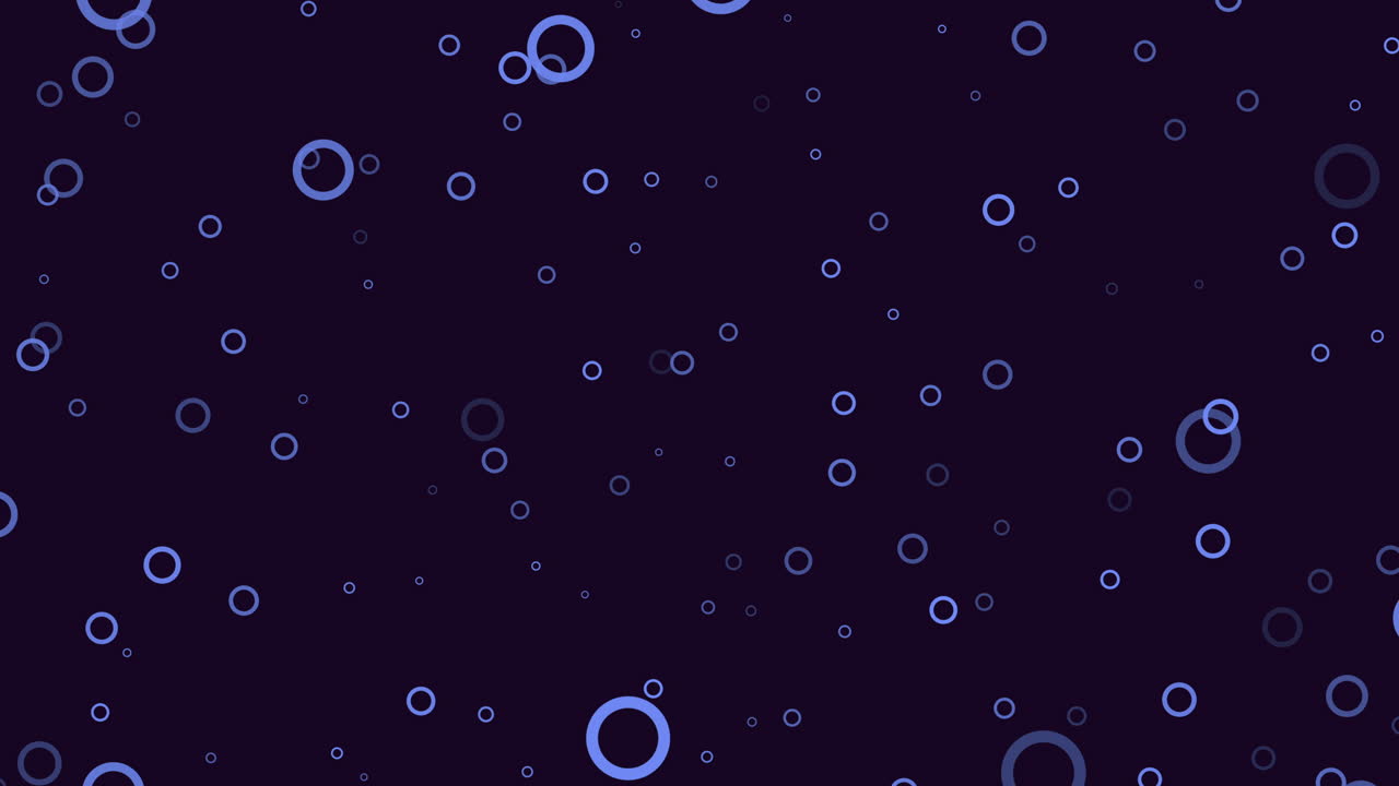 Dynamic blue circles set against a black backdrop create a mesmerizing visual display. Their swirling motion forms a captivating composition within the frame