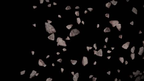 volando muchas piedras de roca en fondo negro. explosión de salpicaduras rotas. concepto de desafío. animación 3d de salpicadas de piedra girando. animación de bucle.