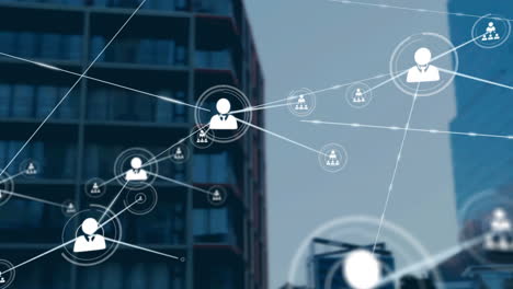 network of profile icons against tall buildings in background