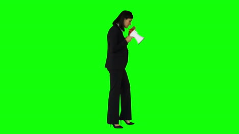 Businesswoman-shouting-through-a-megaphone