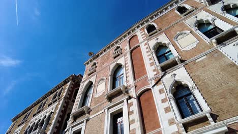 architectural facade and windows of typical buildings in venice, italy