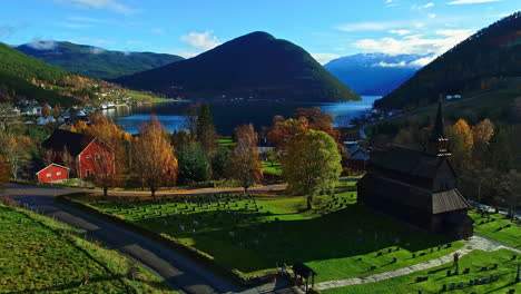 Idealistic-Mjosa-Norway-lake-residential-shores-graveyard-aerial