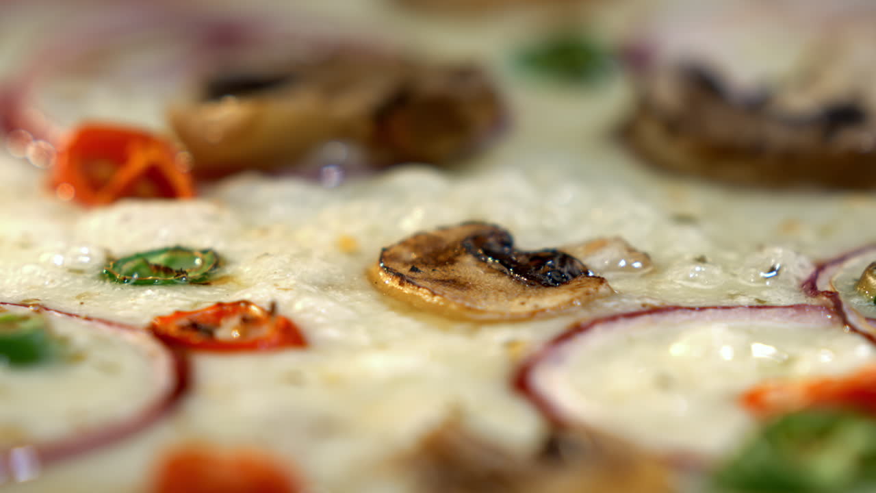 Pizza with Mushrooms, Red Onion, and Chili Pepper