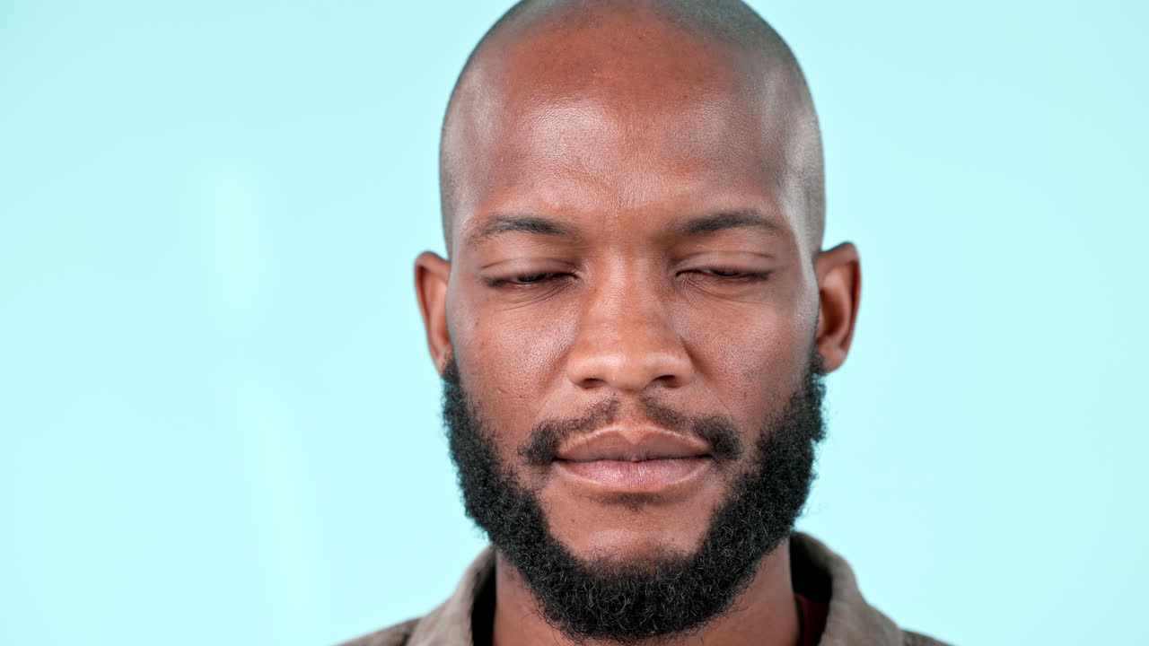 Thinking, confused and face of black man in studio