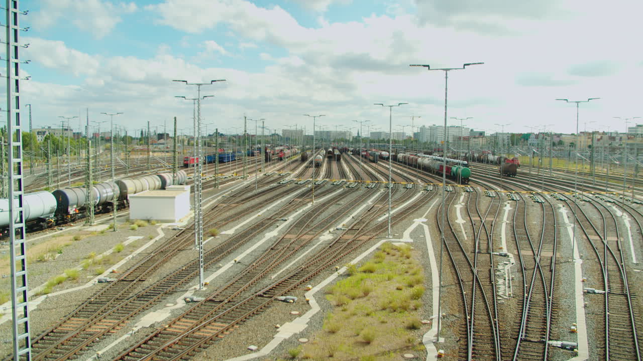 Time lapse of a rail fiddle yard or train formation yard. Cars or Wagons rolling down the shunting hump into designated tracks