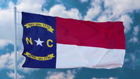 north carolina flag on a flagpole waving in the wind, blue sky background