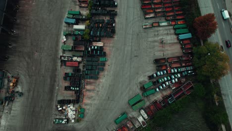 garbage-trucks-standing-parked-at-parking-lot-helping-waste-management