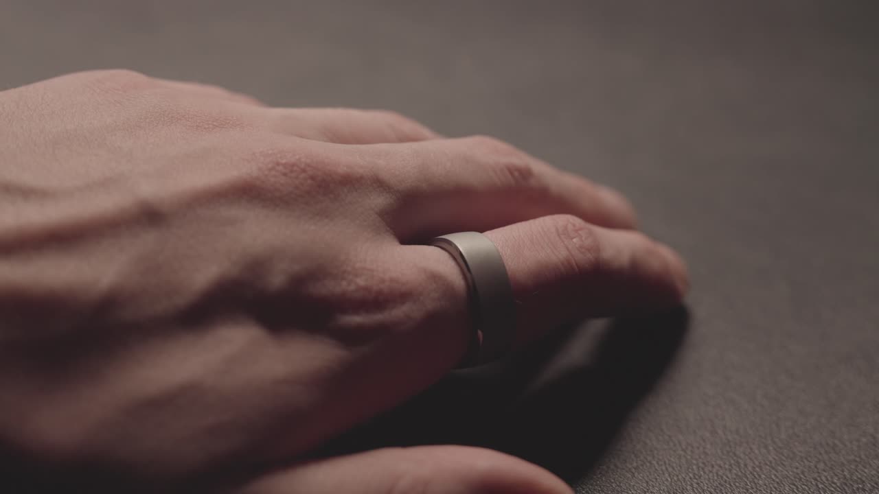 Smart ring worn on finger processes health and sleep signals. New wearable tracker technology