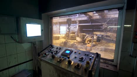 industrial control room with construction equipment