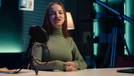 smiling influencer in studio waving hand, greeting audience