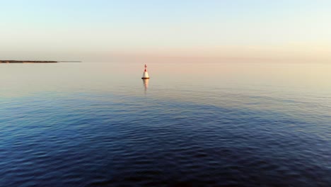 aerial: super beautiful sunset over the ocean with calm waters