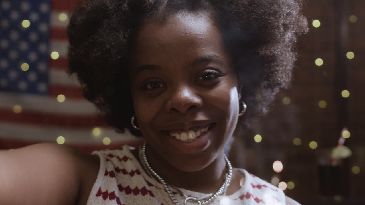 Woman Celebrating Independence Day with Sparkler