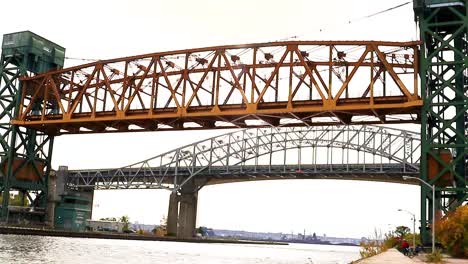 A-Canadian-lift-bridge-descends-from-its-maximum-height-to-three-quarters-of-its-travel