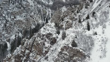 snowy canyon - american fork canyon during winter in utah - aerial drone shot