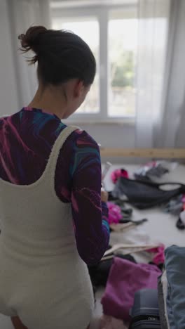 woman preparing for travel or packing
