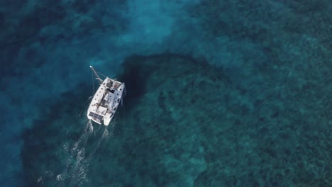 catamaran sailing in turquoise waters