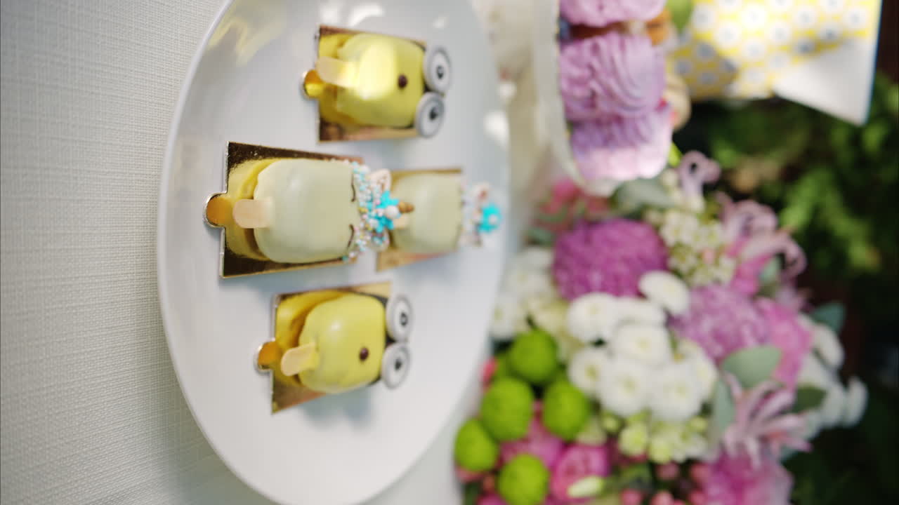 Composition with flowers, macaroons sweets desert and coffee and tea