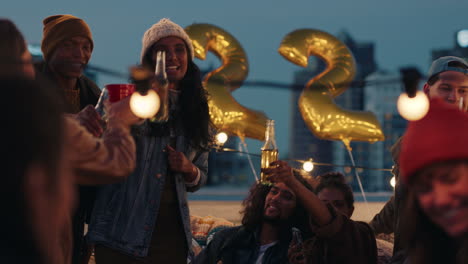 happy group of friends celebrating birthday party on rooftop at sunset beautiful young enjoying celebration making toast to friendship