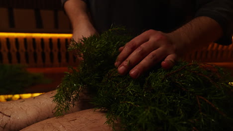 herbal body treatment in a sauna