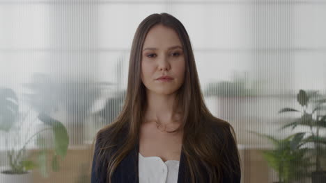 portrait beautiful young business woman intern looking serious successful female entrepreneur in professional management career slow motion
