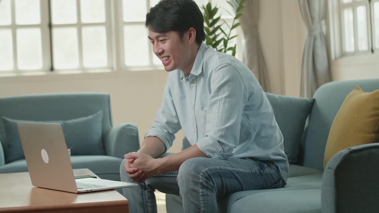 Male Use Laptop Computer And Video Call With Friend In Home, Video In 4K