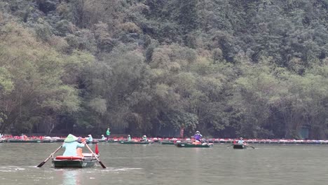 teams rowing in sync on a calm river