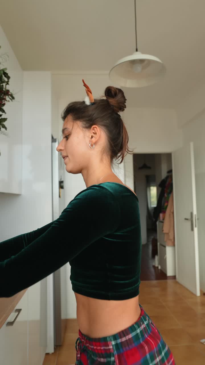 Woman preparing Christmas food in kitchen