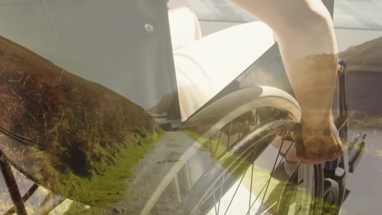 animación del paisaje sobre un hombre caucásico discapacitado sentado en silla de ruedas